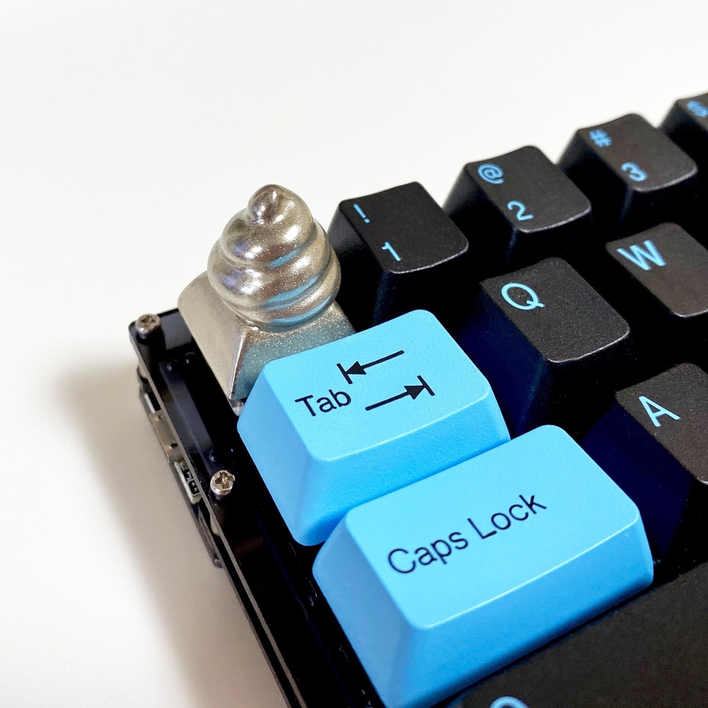 poop keytop metal color