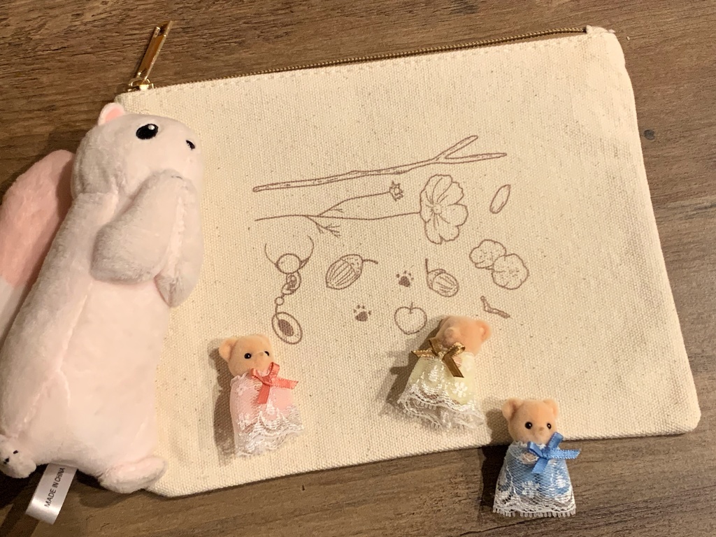 トパのひろいものいっぱいポーチ