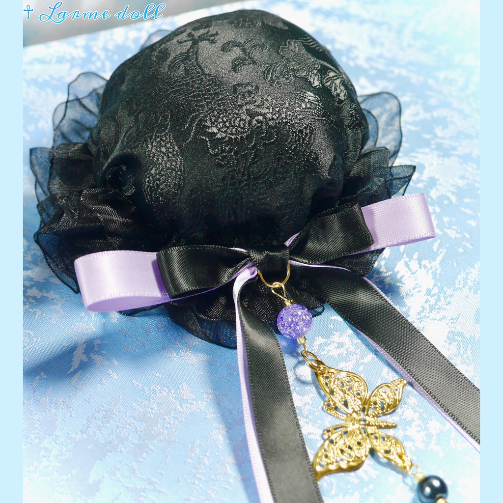 【受注生産】《☥》ダブルリボンタッセル付きお団子カバー カラー▷黒×紫(接合パーツ、蝶チャームゴールドカラーver.)