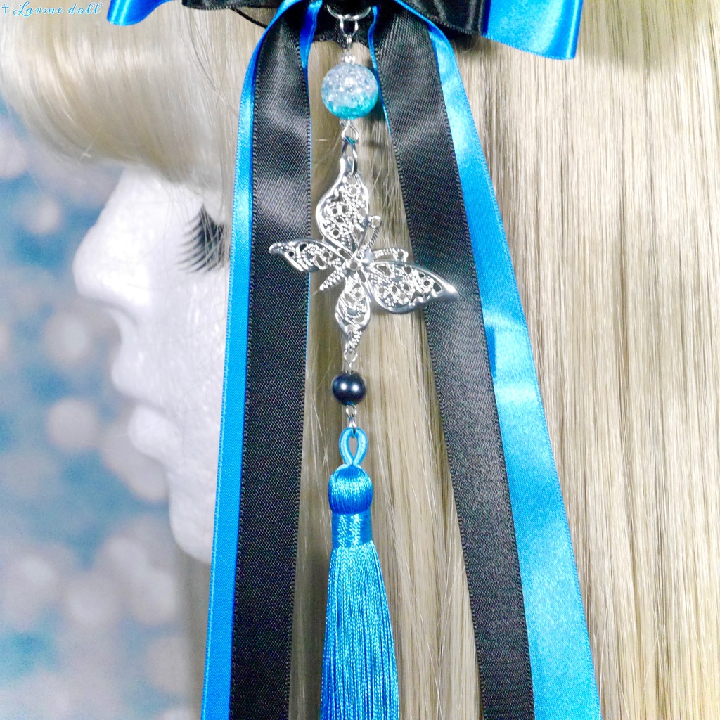 【受注生産】《☥》ダブルリボンタッセル付きお団子カバー カラー▷黒×シルバー×青(接合パーツ、蝶チャームシルバーカラーver.)