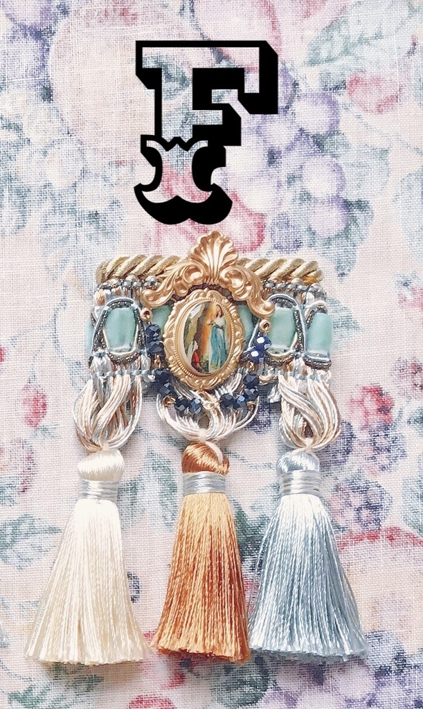 tassel brooch
