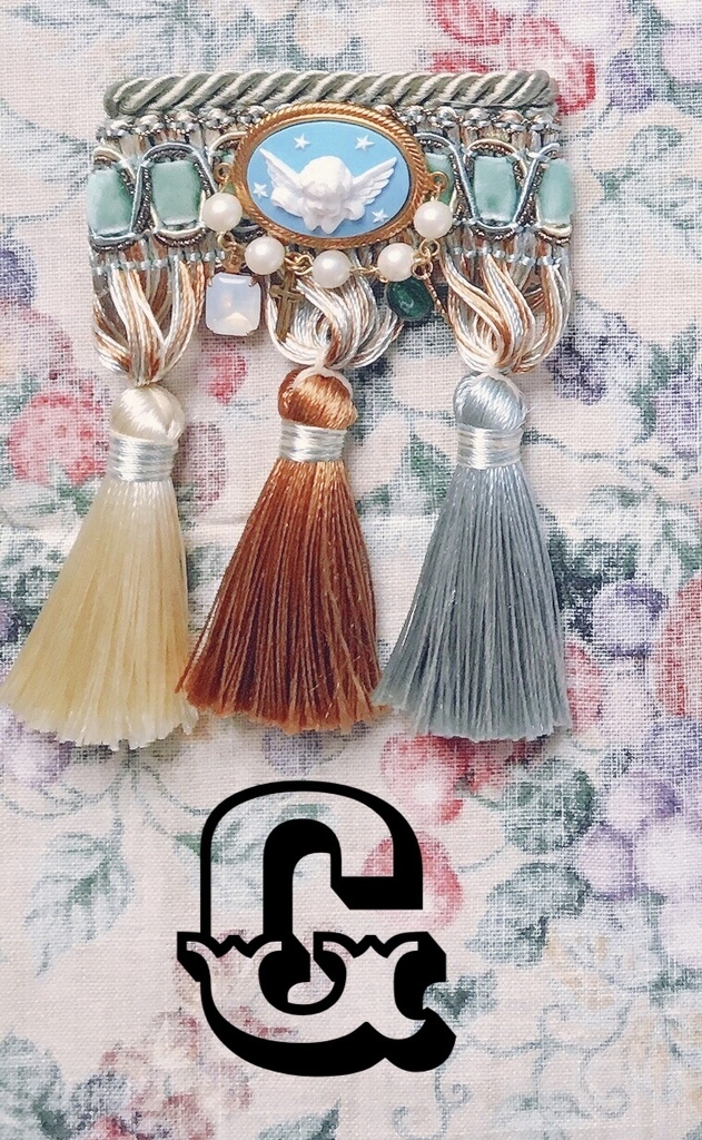 tassel brooch
