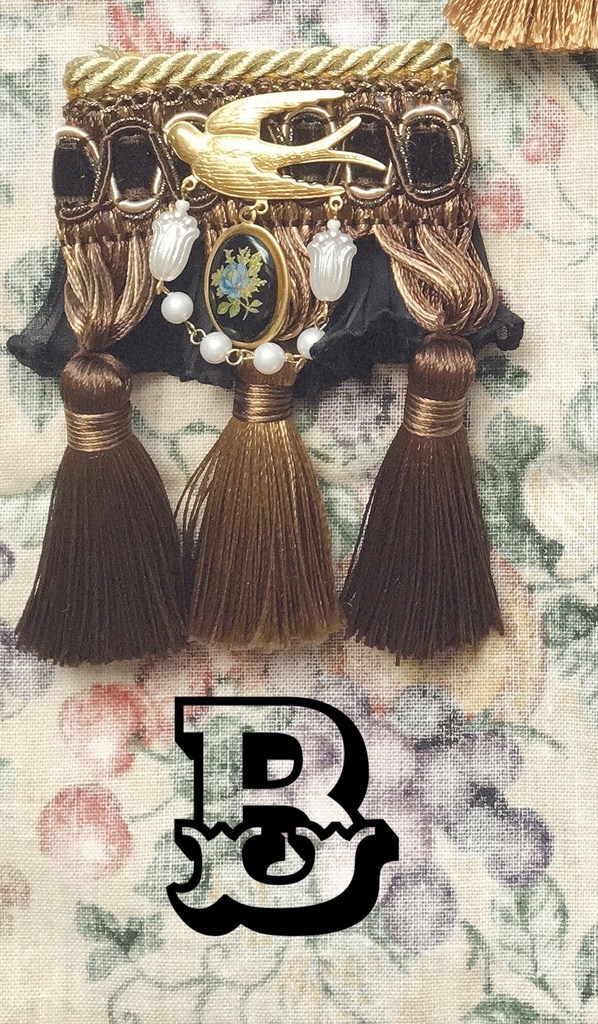 tassel brooch