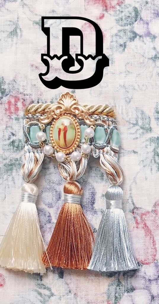 tassel brooch