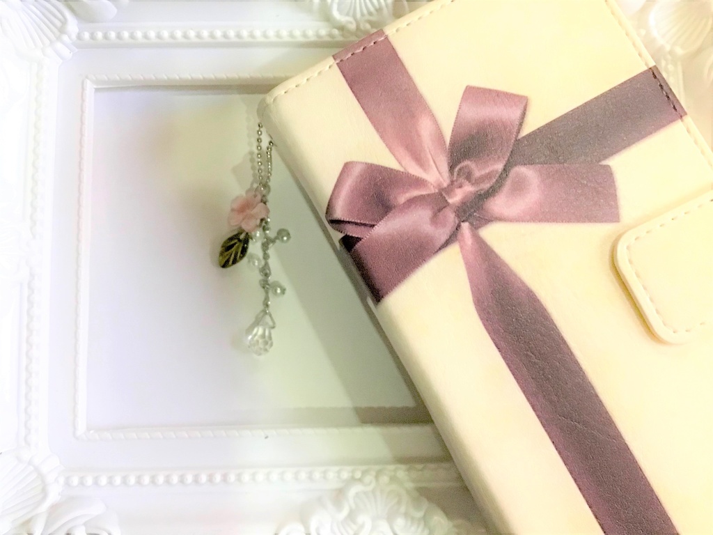 45 ピンクシェルの桜チャーム/ストラップ/イヤホンジャック