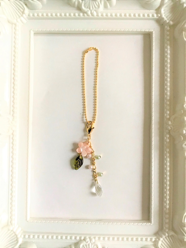 45 ピンクシェルの桜チャーム/ストラップ/イヤホンジャック