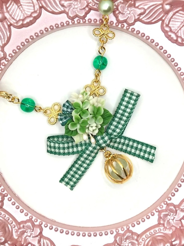 213 クローバーブーケのネックレス(かごチャーム)