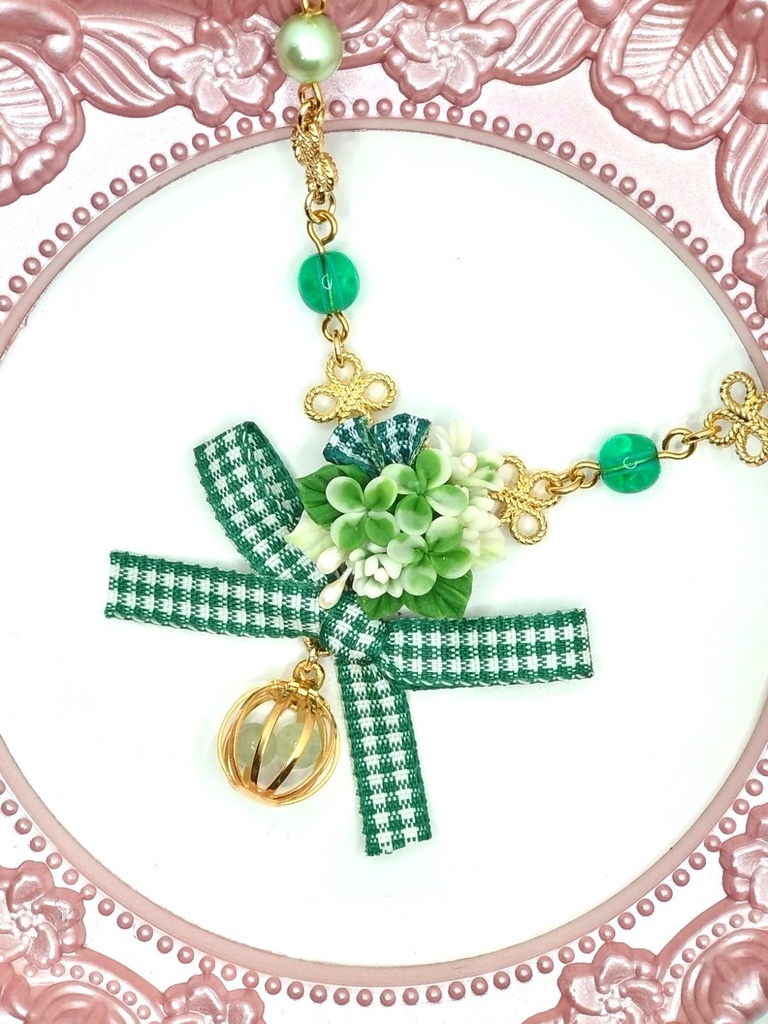 213 クローバーブーケのネックレス(かごチャーム)