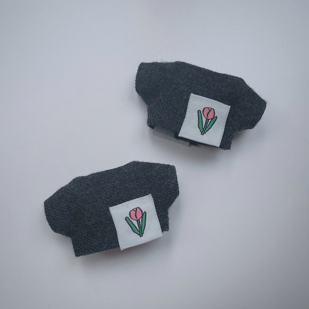 チューリップタグのニットシャツ