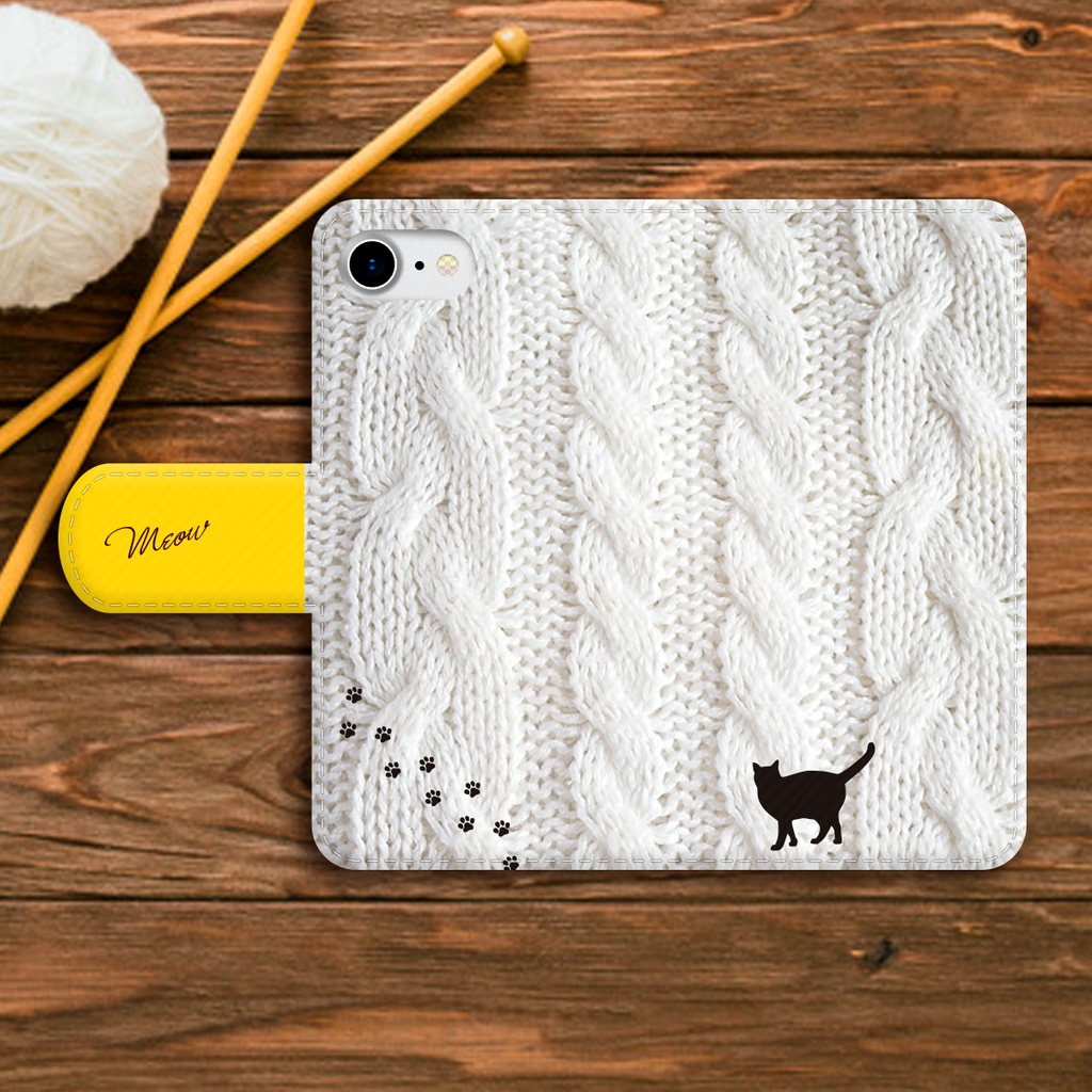 にゃんこアランニットの手帳型スマホケース(ホワイト×黄) 全機種対応 手帳型 スマホケース iphone15 iphone16e iphone14 iPhone17 Air 猫 黒猫