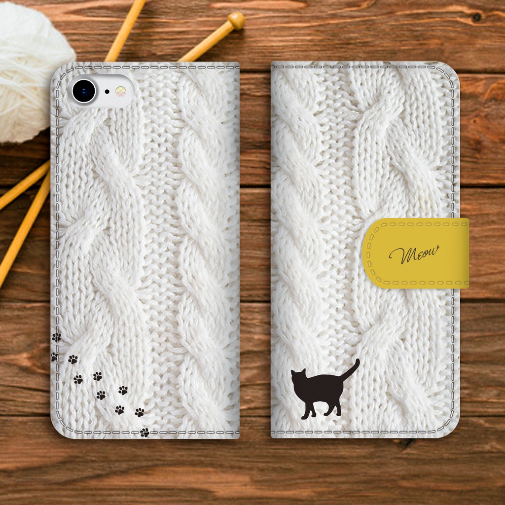 にゃんこアランニットの手帳型スマホケース(ホワイト×黄) 全機種対応 手帳型 スマホケース iphone15 iphone16e iphone14 iPhone17 Air 猫 黒猫
