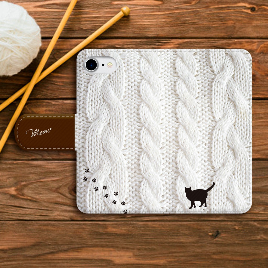 にゃんこアランニットの手帳型スマホケース(ホワイト×ブラウン) 全機種対応 手帳型 スマホケース iphone15 iphone16e iphone14 iPhone17 Air 猫 黒猫