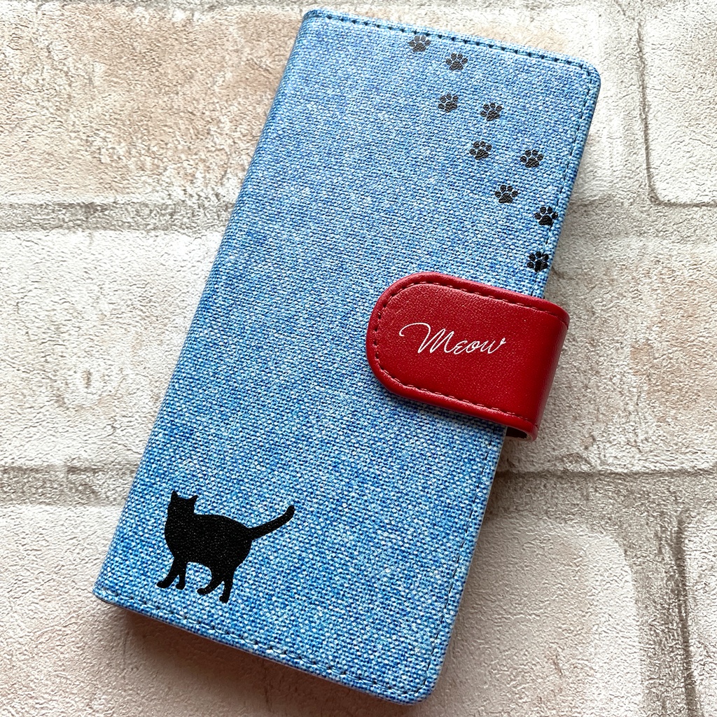 にゃんこデニムの手帳型スマホケース(ライトブルー×赤) iPhone17 Air iphone15 iphone16e iphone14 全機種対応 猫 黒猫 デニム 手帳型 スマホケース