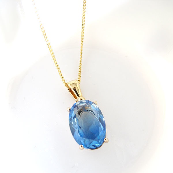 きれいめ上品な ブルー×ブルーグリーンのオーバルカットネックレス 16kgp使用