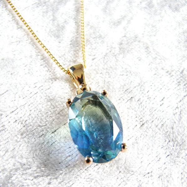 きれいめ上品な ブルー×ブルーグリーンのオーバルカットネックレス 16kgp使用