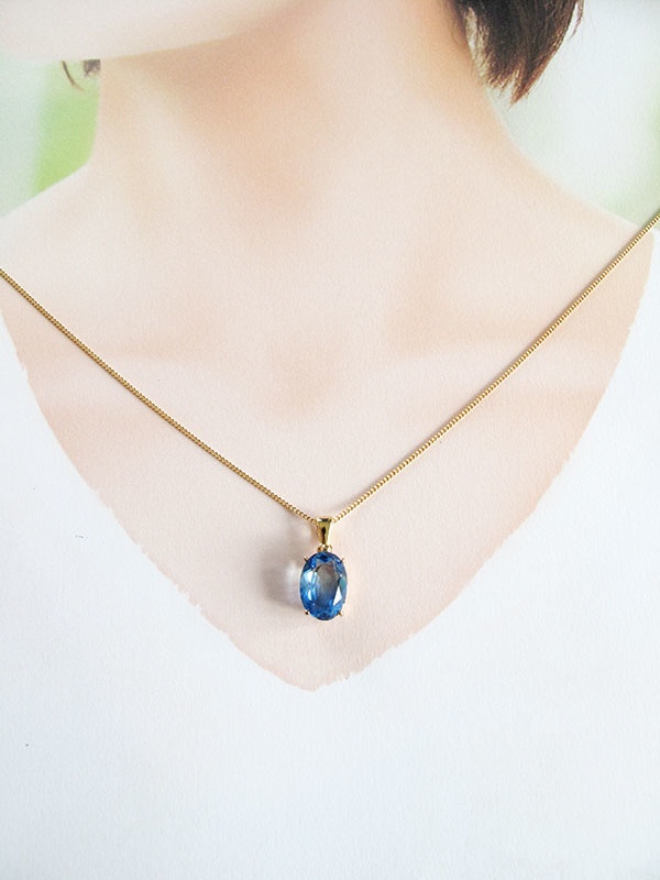 きれいめ上品な ブルー×ブルーグリーンのオーバルカットネックレス 16kgp使用