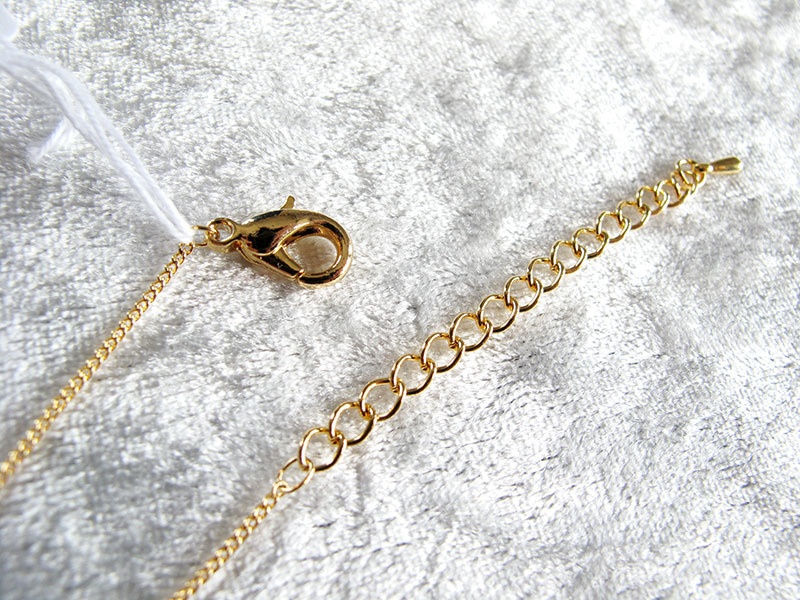 ブルーグラデーションのオーバルカットネックレス 16kgp使用