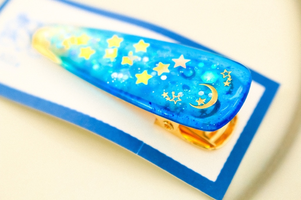 ゴールドムーンのヘアクリップ シアン×クリア ゴールド金具