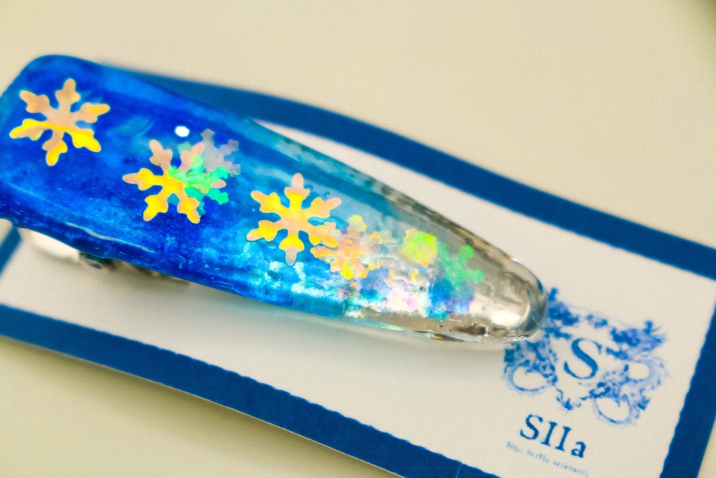雪の結晶のヘアクリップ シアン×クリア シルバー金具