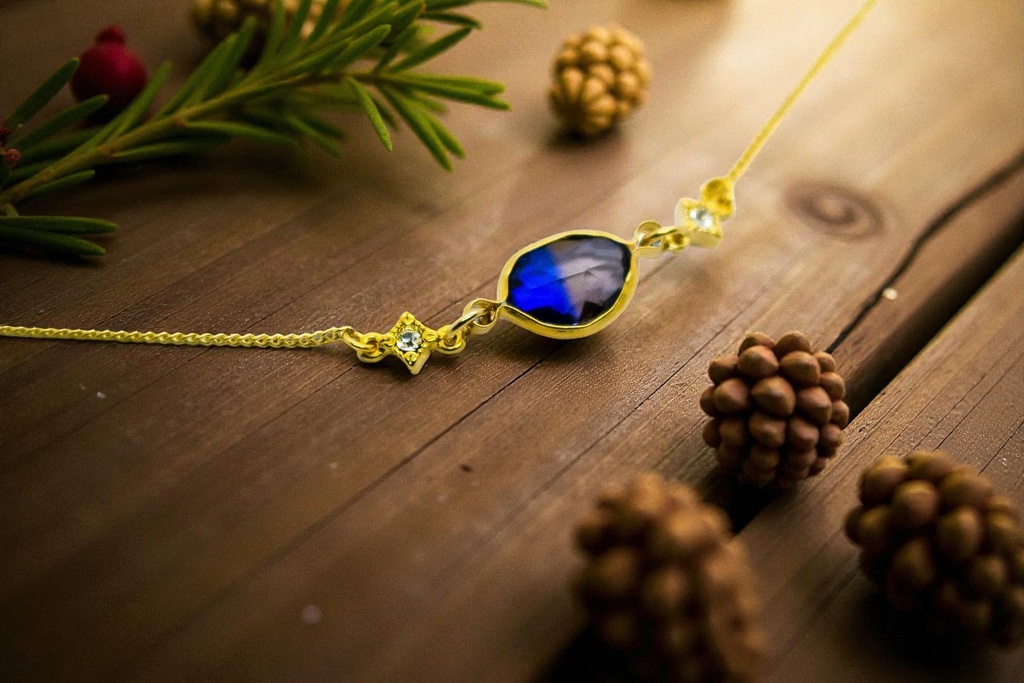 グラデーションクリスタルガラスのブレスレット　ブルー×ブラウン　変形カットゴールド金具