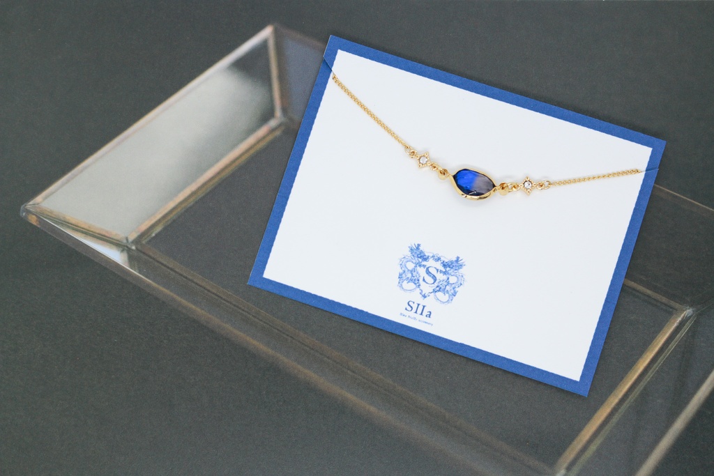 グラデーションクリスタルガラスのブレスレット　ブルー×ブラウン　変形カットゴールド金具