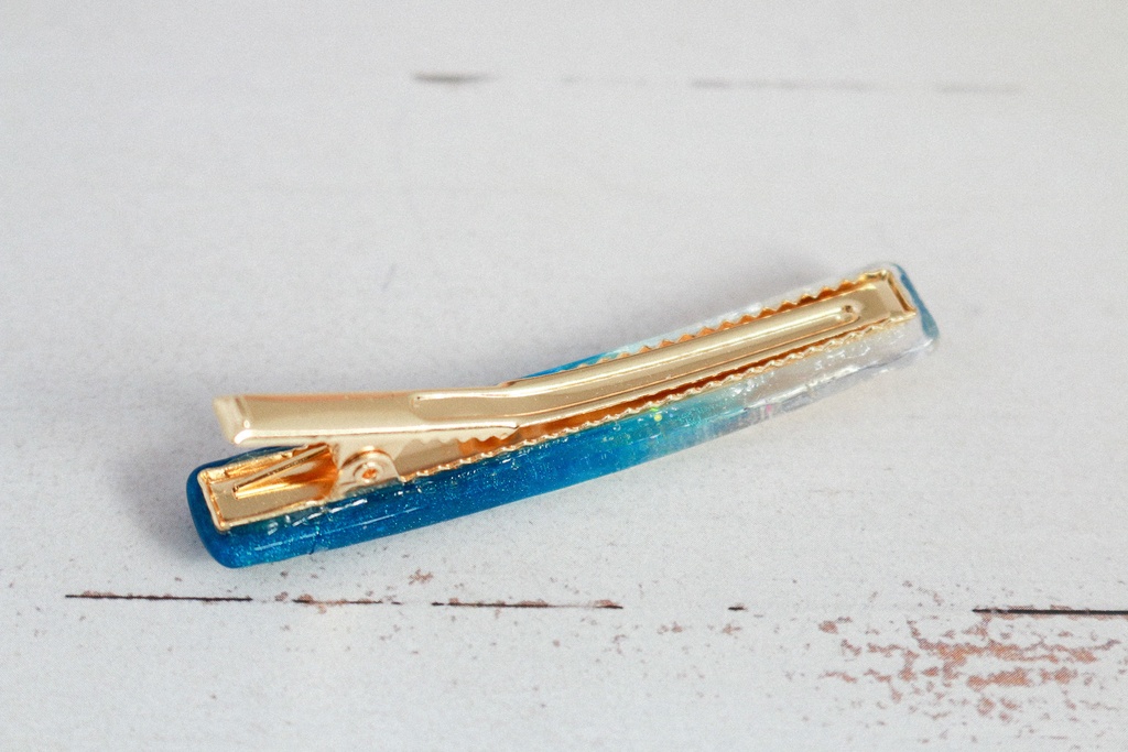 雪の結晶のヘアクリップ スティックタイプ ダークアクア×クリア ゴールド金具