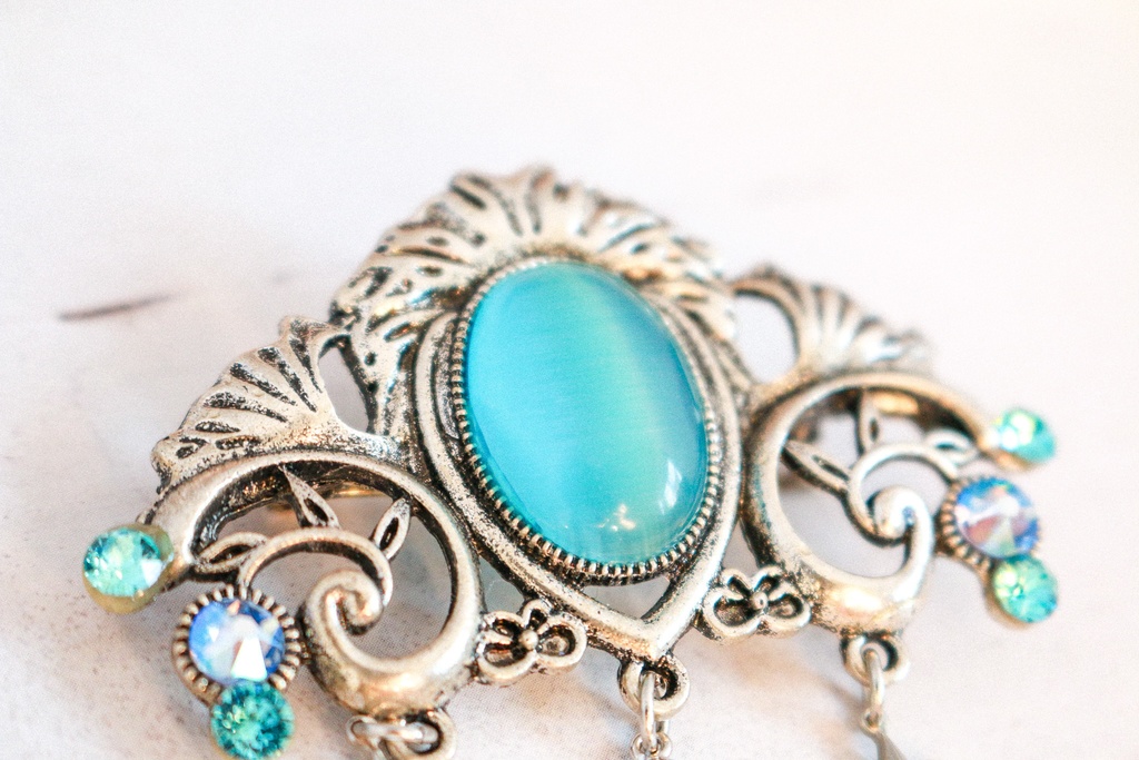 チェコヴィンテージガラスのブローチ ターコイズ(キャッツ) シルバー金具