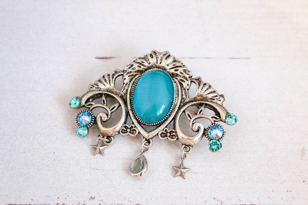 チェコヴィンテージガラスのブローチ ターコイズ(キャッツ) シルバー金具