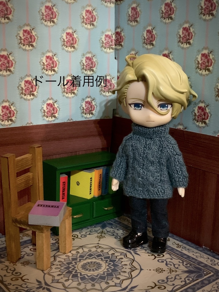 ケーブル模様のタートルネックセーター