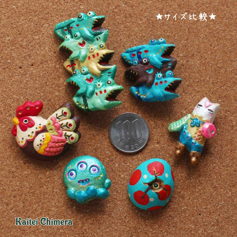 カレイなる積みわっにブローチ