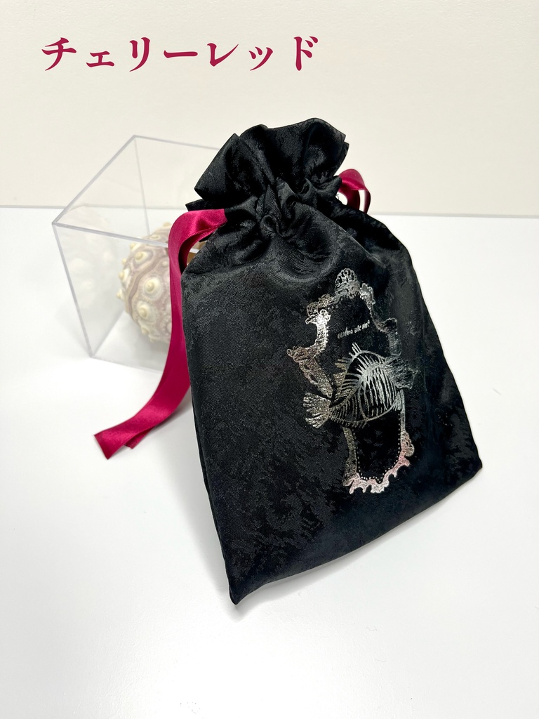 『who ate me?』巾着ポーチ