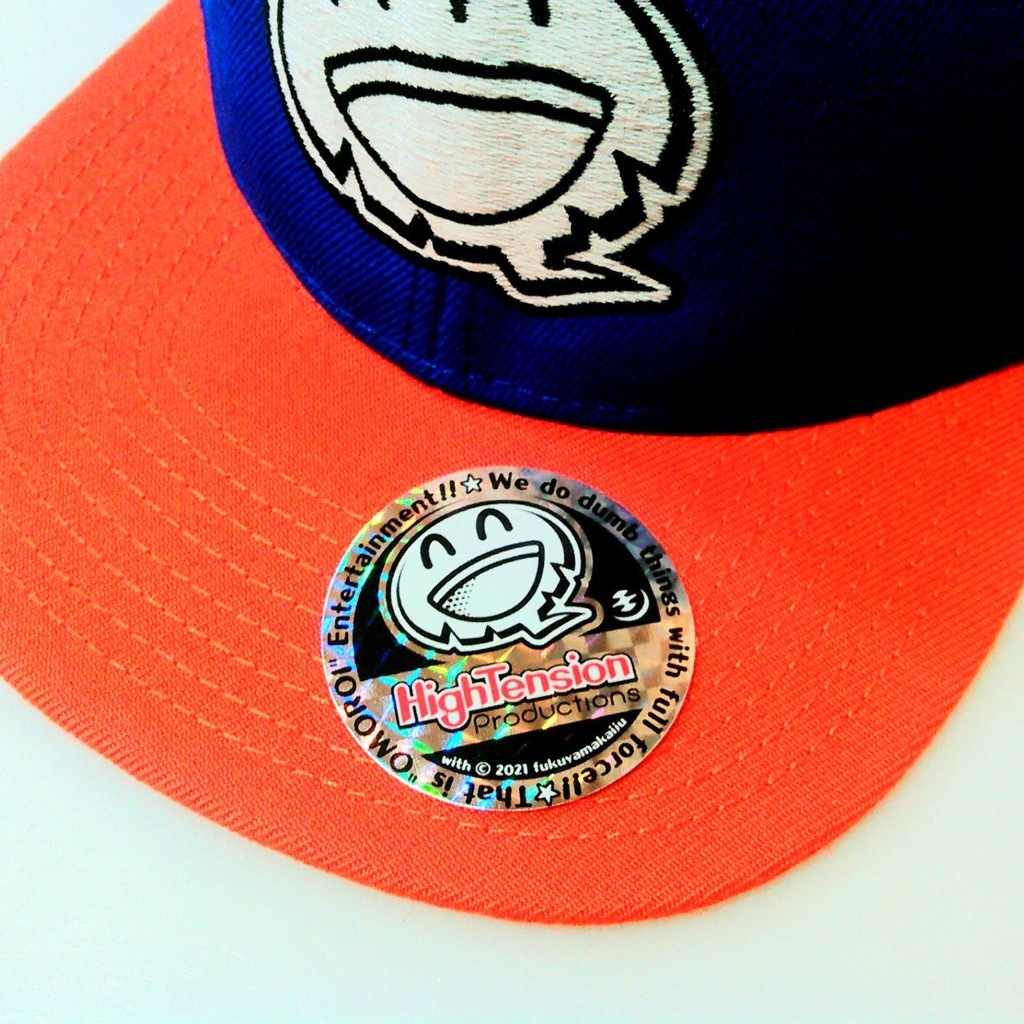 HTP ハイテンションスマイルくんロゴキャップ「Orange × Blue 」