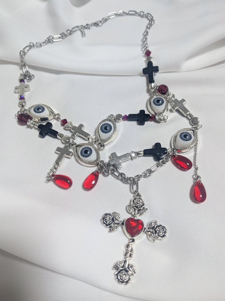 目玉の十字架ネックレス