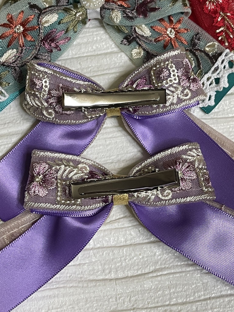 ネコチャンのご飯代にするリボン