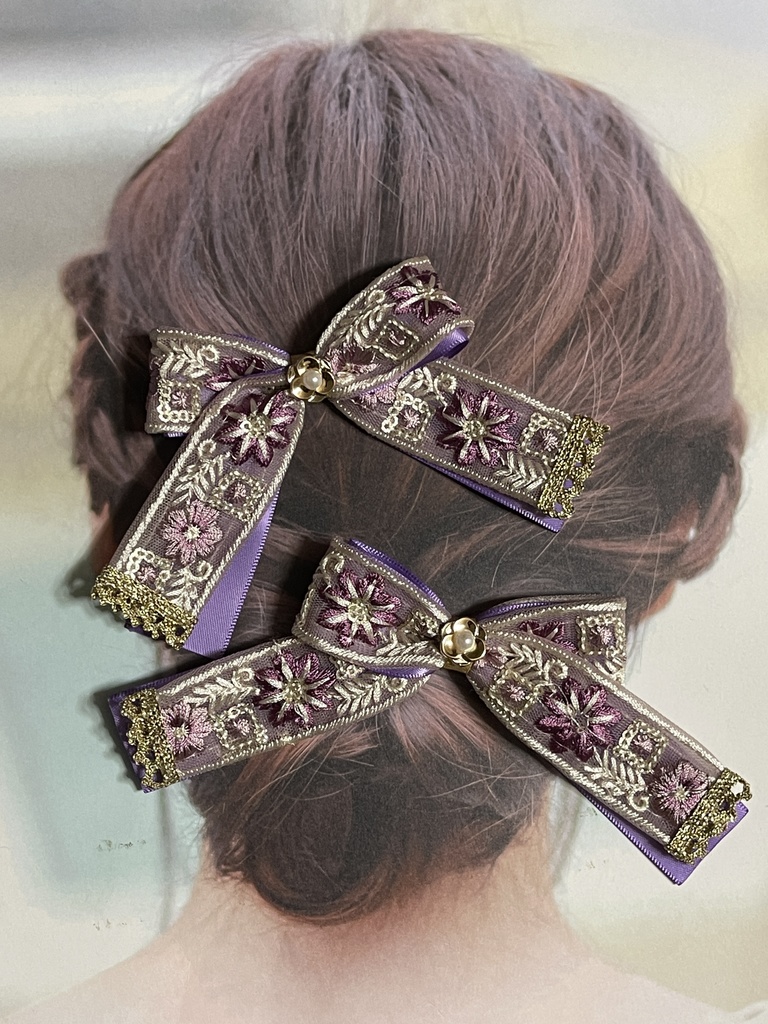 ネコチャンのご飯代にするリボン