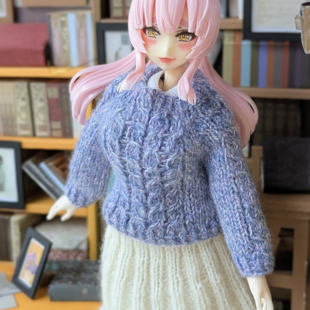 ケーブル模様のセーター