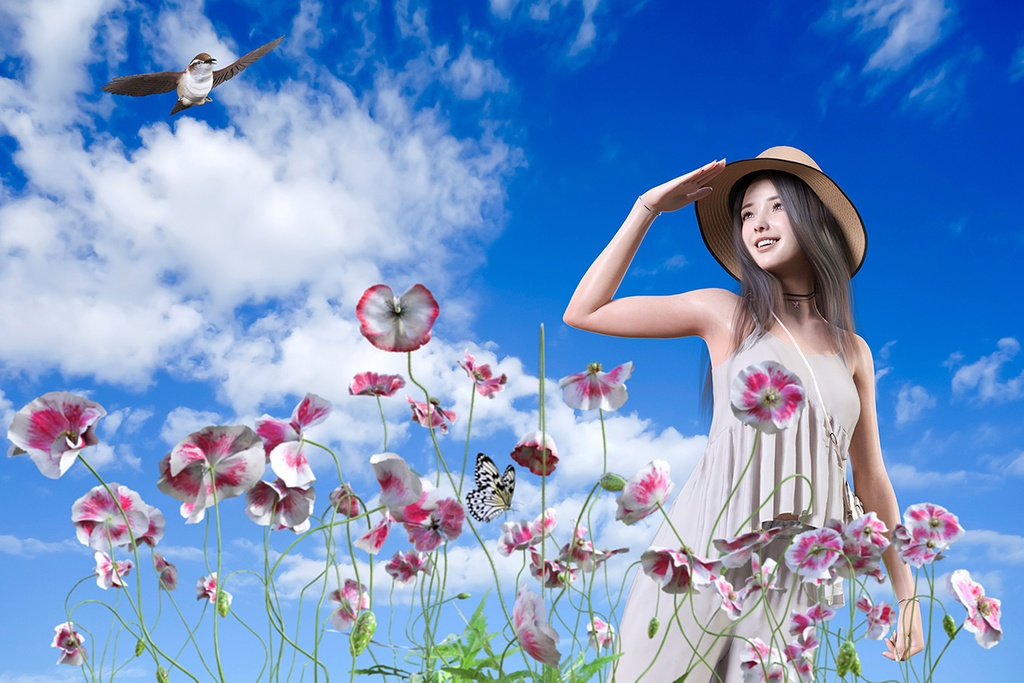 青い空を背景にひなげしの花畑で麦わら帽子をかぶった笑顔の女の子