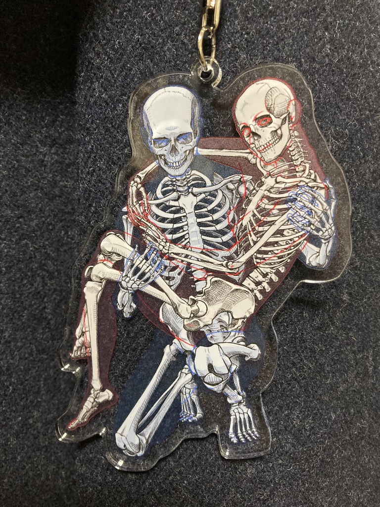 骨格アクリルキーホルダー（お姫様抱っこする男女の骨格）