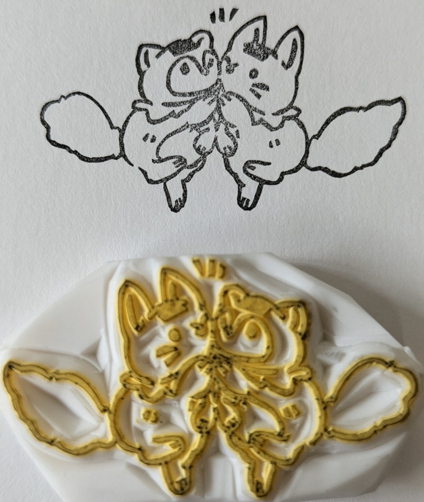 消しゴムはんこ おにぎりな たぬきときつね