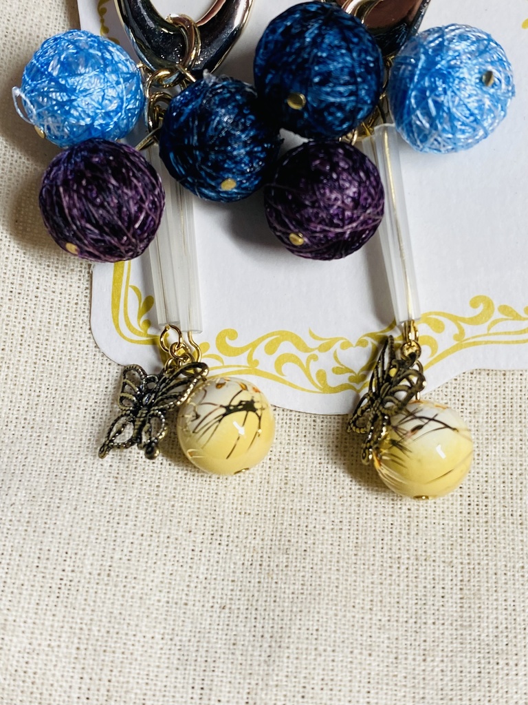 金カムイメージイヤリング:相棒&ダチ