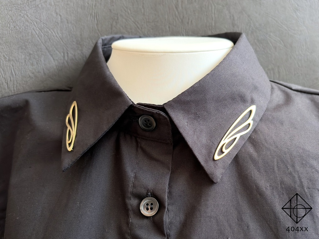 〈風乗りの羽〉ブローチ