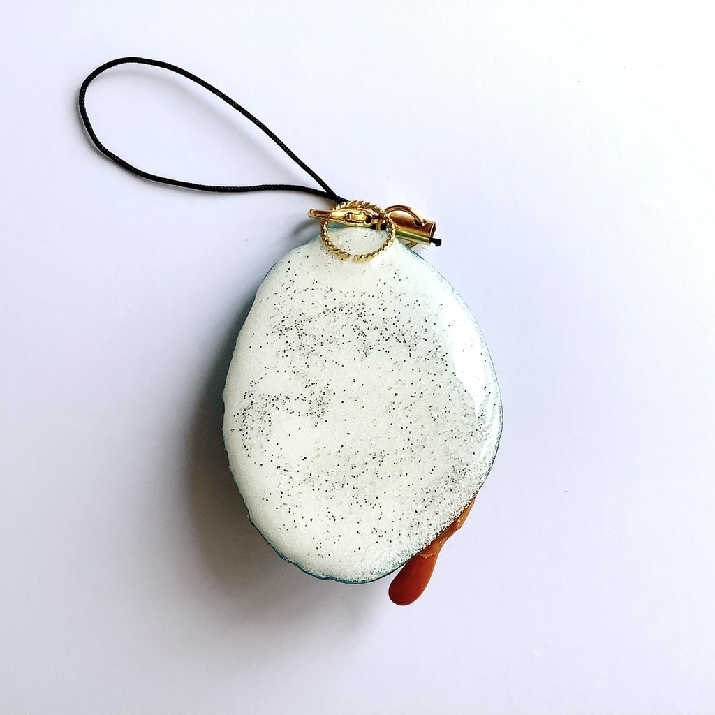 水遊び猫のストラップ