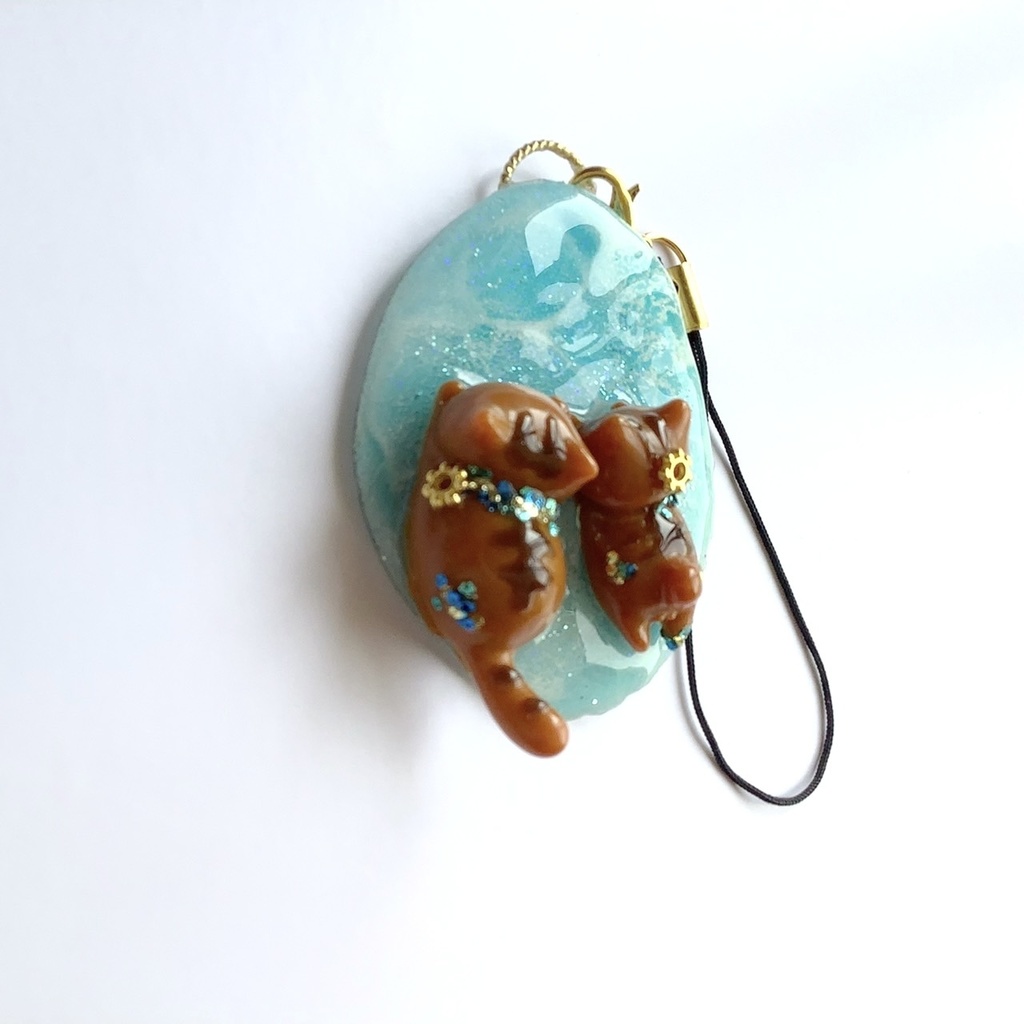 水遊び猫のストラップ