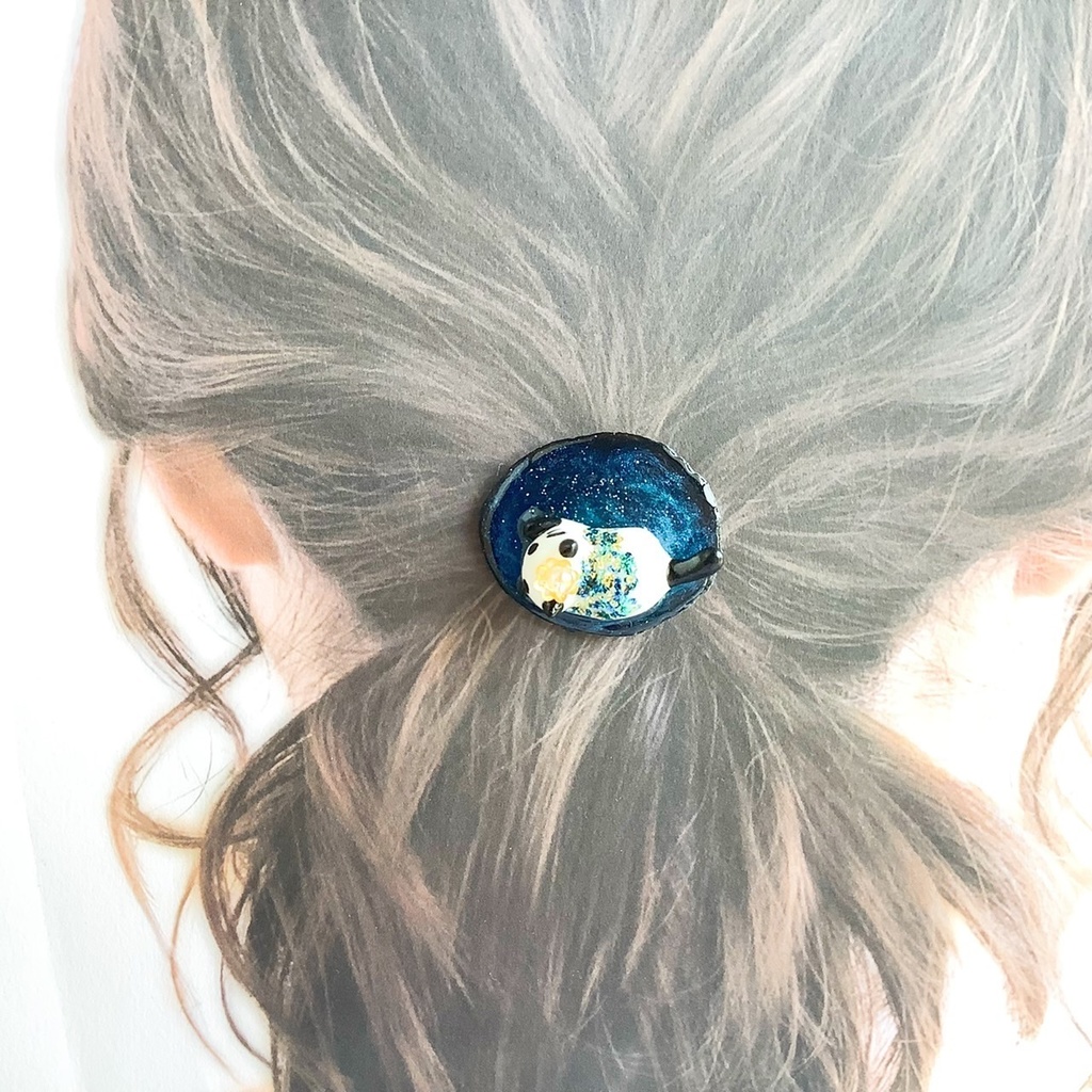 宇宙を泳ぐ猫のポニーフック