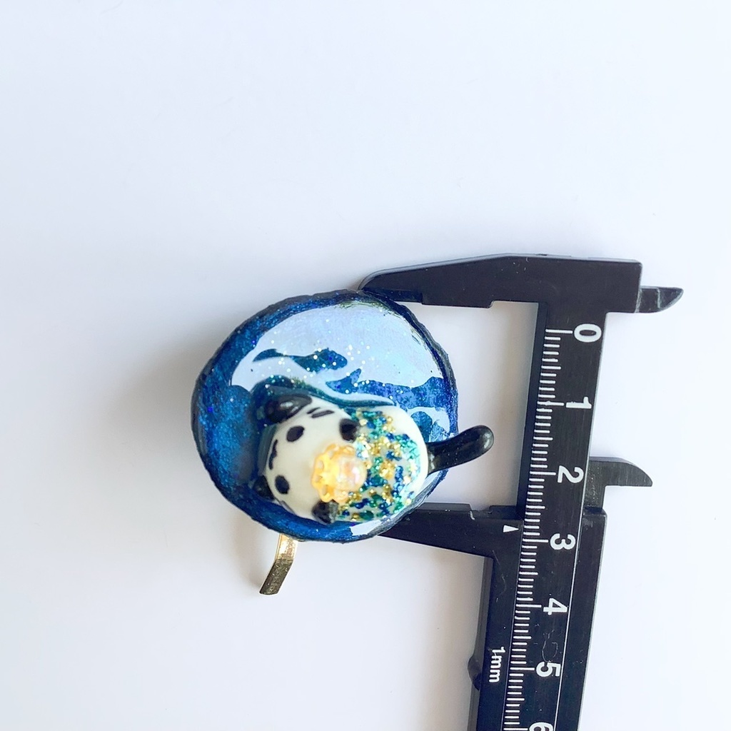 宇宙を泳ぐ猫のポニーフック