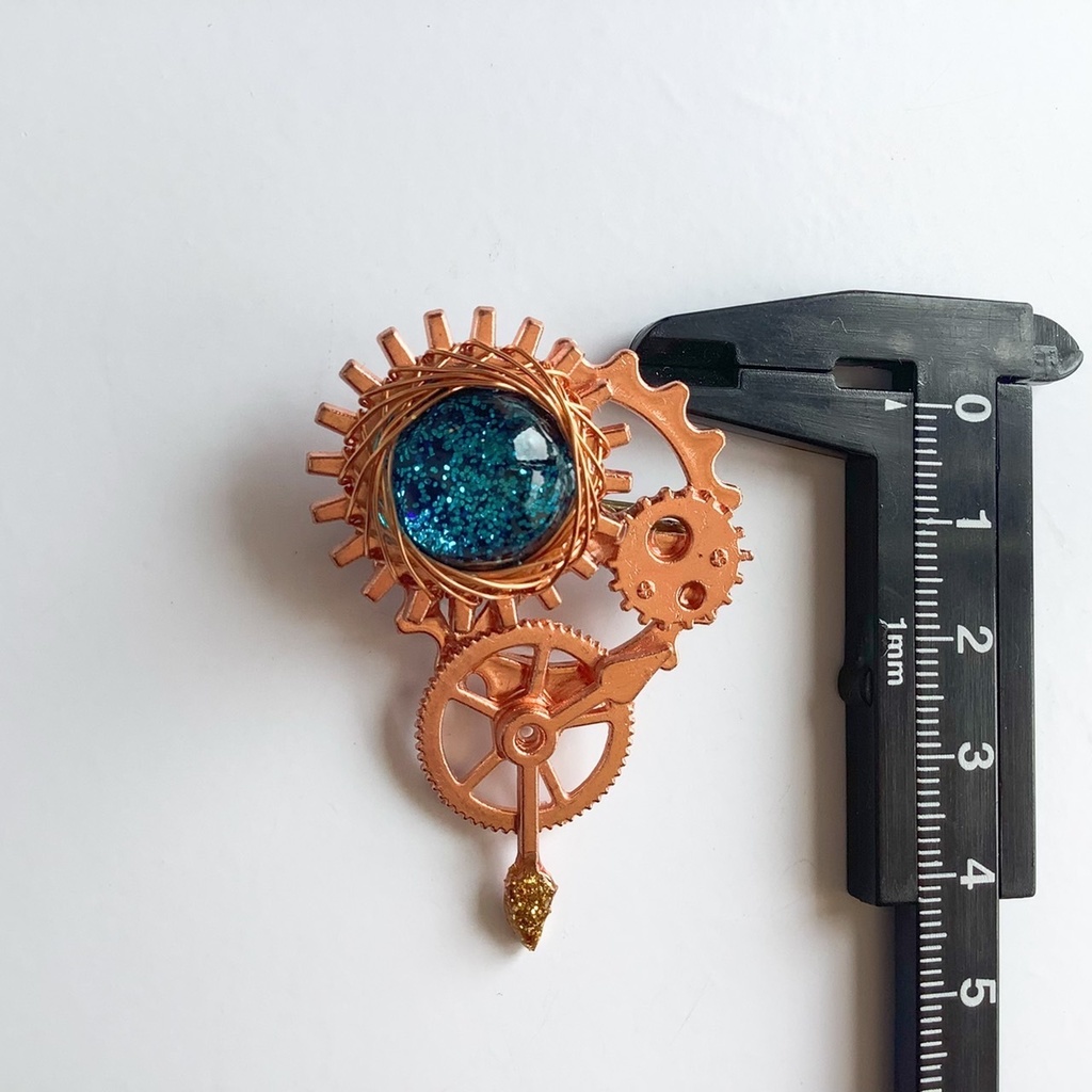 宇宙の時 ブローチ