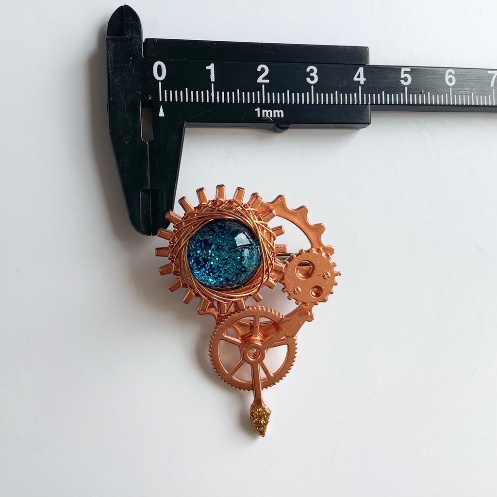 宇宙の時 ブローチ