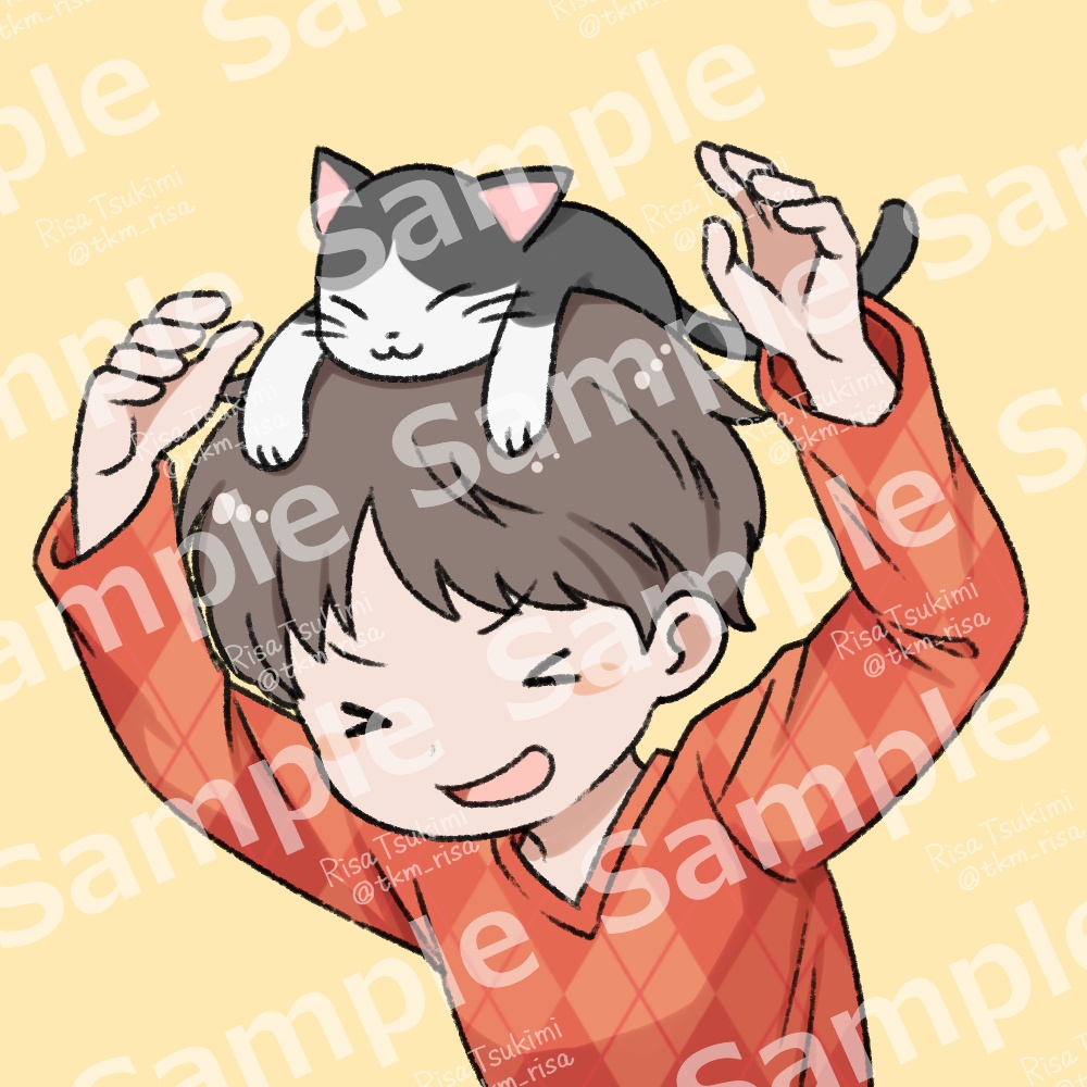 猫とはしゃぐ男の子