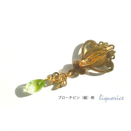 ラウンドクリスタルと雫のペンダント・ブローチピン・キーホルダー