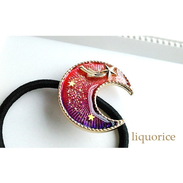 紫と赤色の月のヘアゴム